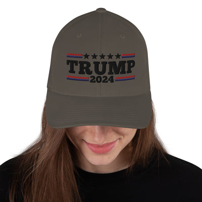 Structured Twill Cap Trump 2024 Black WritingAvailable in two sizes with an elastic stretch band, this hat is a sure winner in comfort! It has an athletic shape with a curved visor. 

• 63% polyester, 34% cotStructured Twill Cap Trump 2024 Black Writing