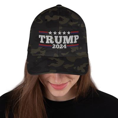 Structured Twill Cap Trump 2024 White WritingAvailable in two sizes with an elastic stretch band, this hat is a sure winner in comfort! It has an athletic shape with a curved visor. 

• 63% polyester, 34% cotStructured Twill Cap Trump 2024 White Writing